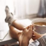 cup-tea-chill-woman-lying-couch